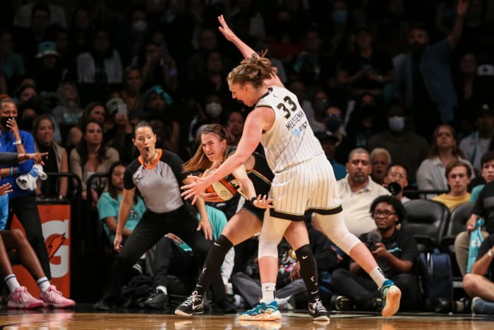New York Liberty guard Sabrina Ionescu (20) is guarded by Chicago Sky forward Emma Meesseman (33) in the fourth quarter at Barclays Center.